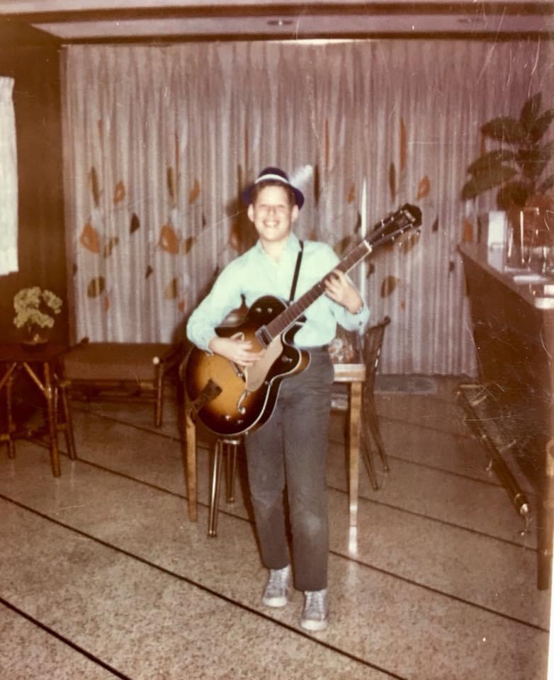 Shambhu at age 10 with his first guitar
