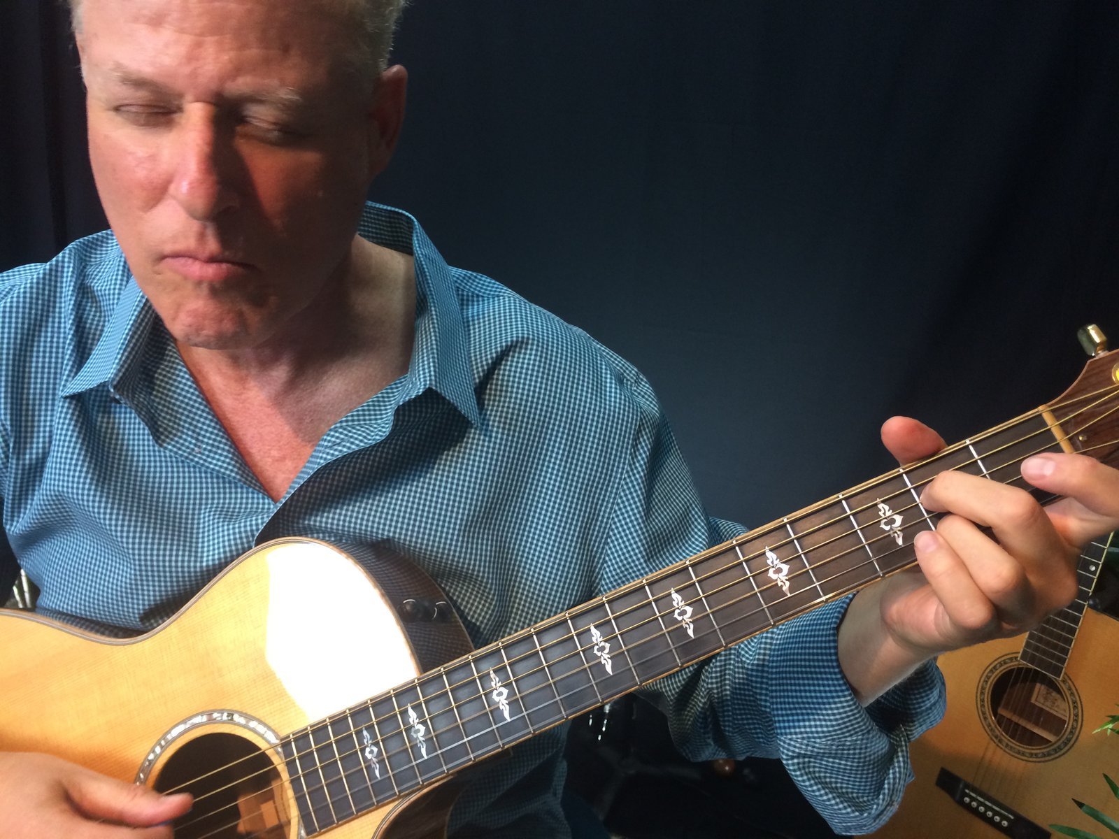 Shambhu playing guitar
